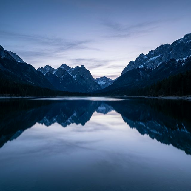 Serene alpine lake at dawn